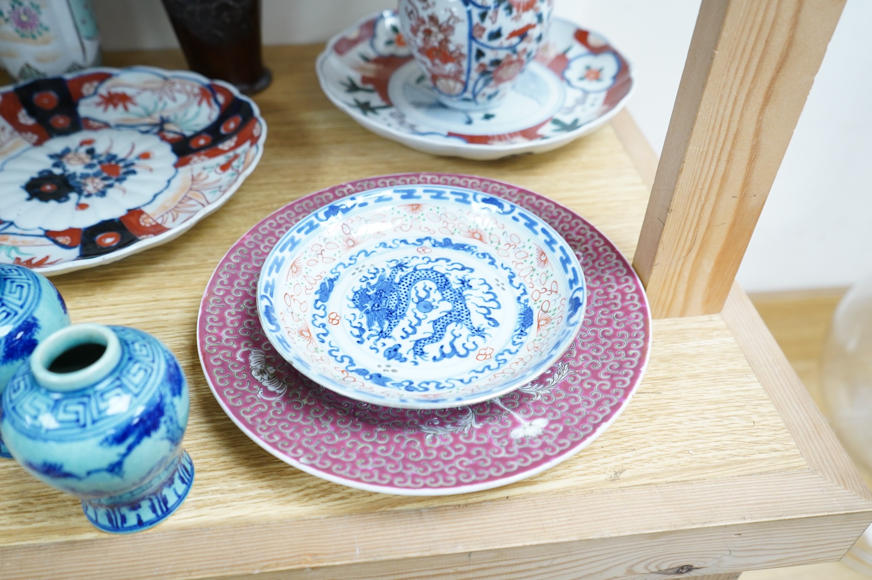 A collection of Asian ceramics to include an inside painted glass snuff bottle, pink ground dish and an Imari dish